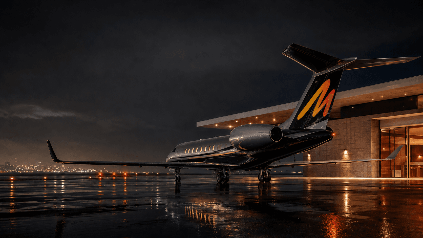 Black private jet with MetaJetz tail livery on a rain-lit night ramp